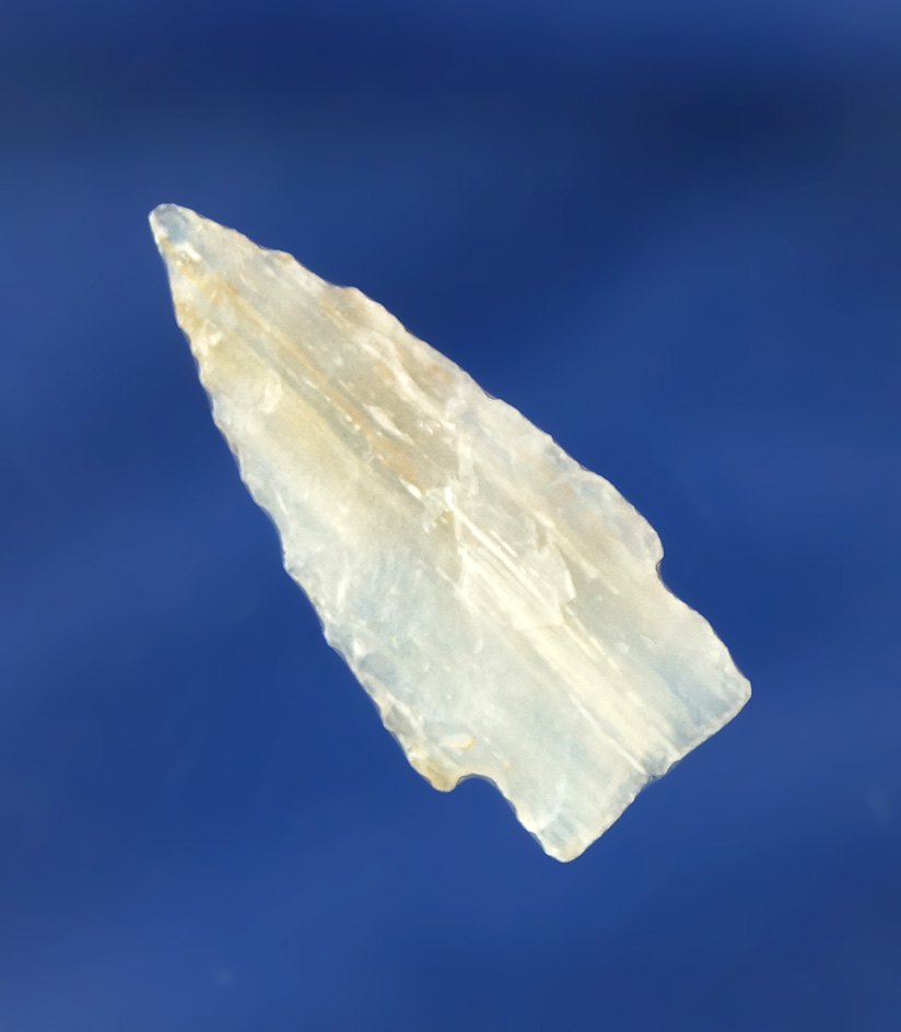 Very thin 1 3/16" Stemmed arrowhead made from beautifully translucent Agatized Wood