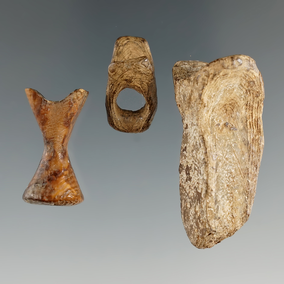 Set of three Inuit bone finger grips, largest is 1 9/16".