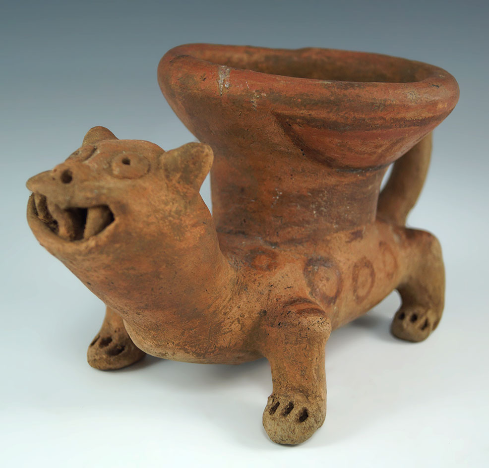 Jaguar effigy with co-joined bowl on it's back - 9" x 5" tall. Intact condition. Found in Panama.