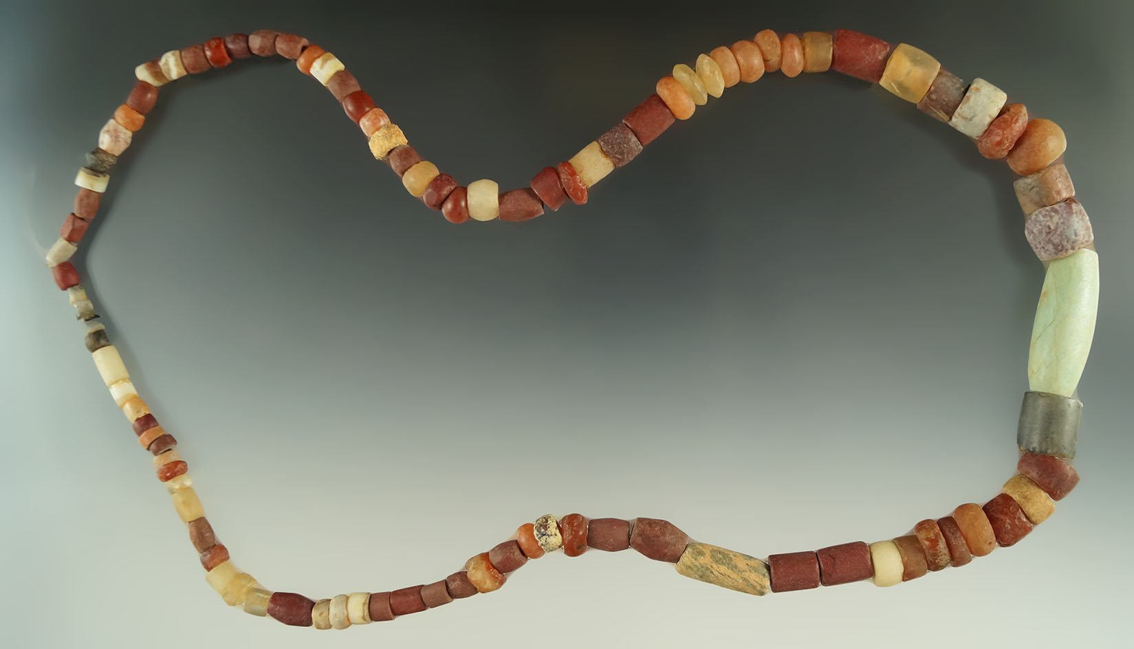 Nicely restrung necklace that is 24" long found in the Peru/Ecuador border in the 1950s.