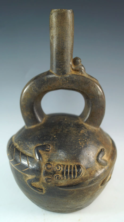 9 5/8" Chimu culture stirrup bottle with alligator effigies found in Peru. Bennett COA.