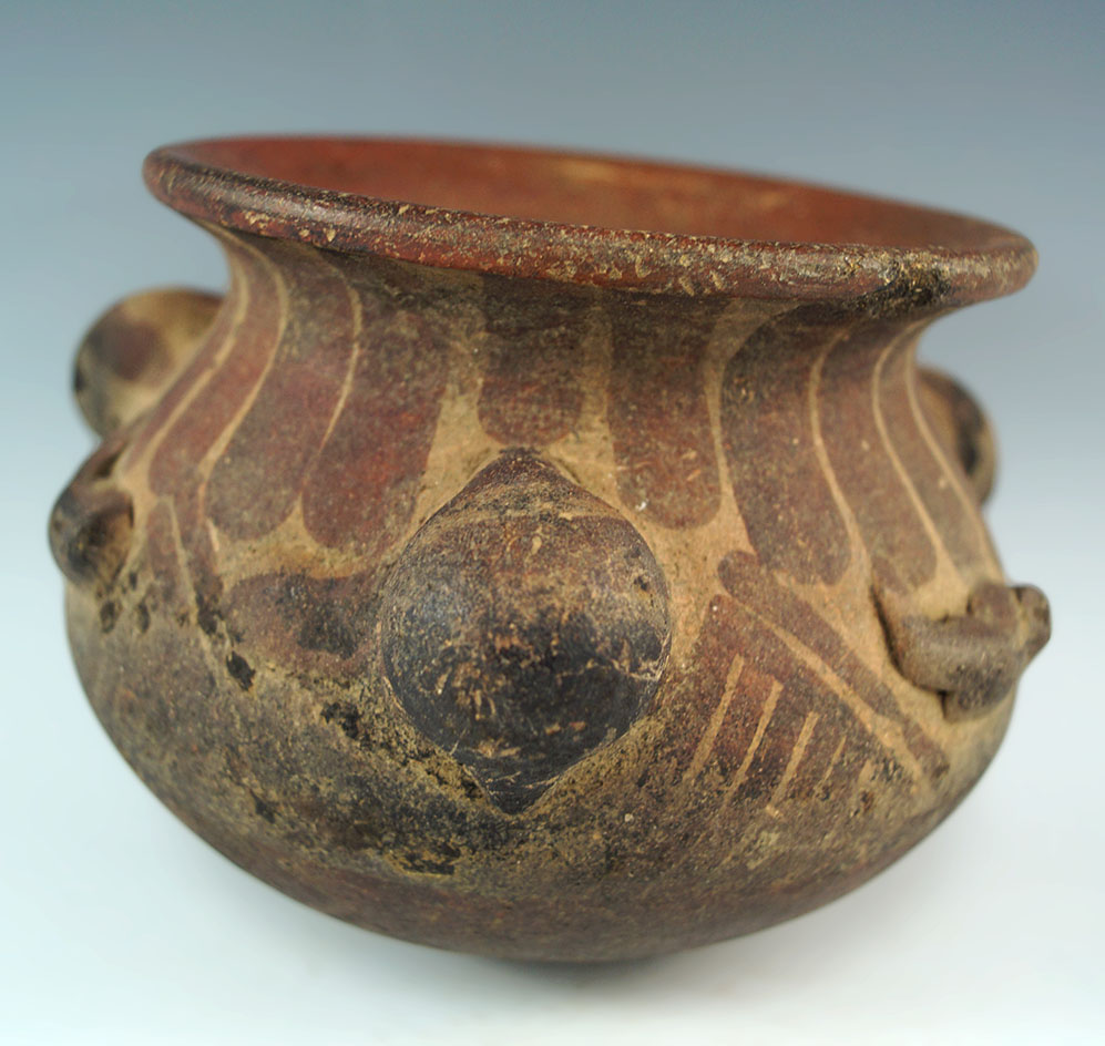 Solid 6 3/4" wide decorated pottery jar with appliques on exterior. Found in Peru. Ex. Roy Pohler.