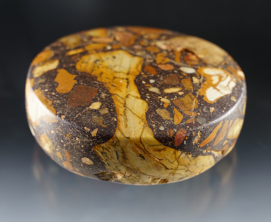 Exceptional polish on this 4" Conglomerate Stone Discoidal found in Tennessee. 