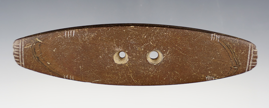 Very unique engravings on this 5 13/16" Slate Gorget found in Tennessee.