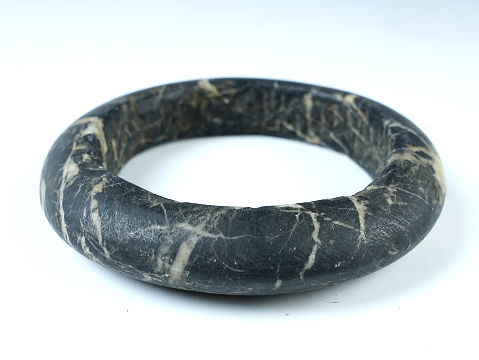4 3/4" diameter Neolithic black and white Stone Bracelet that is nicely patinated. 