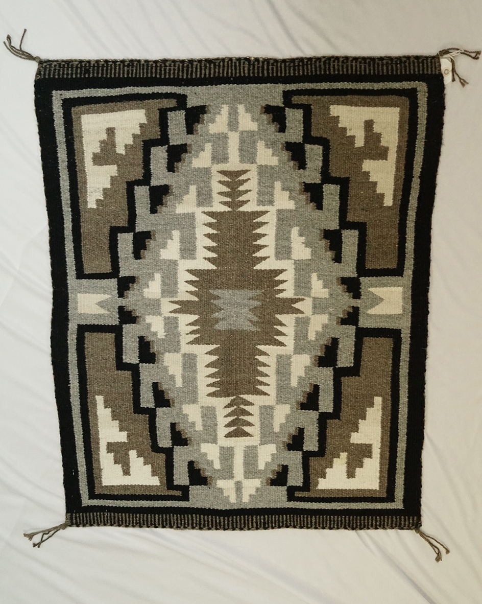 25" by 32" "two gray hills" genuine Navajo rug woven by Katy Benally from Page, Arizona.