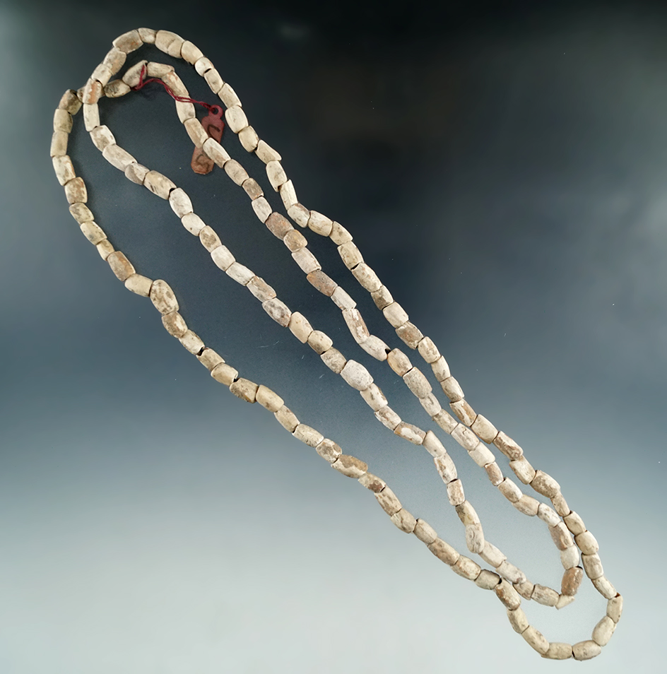 36" strand of drilled shell beads found a site in New Jersey.