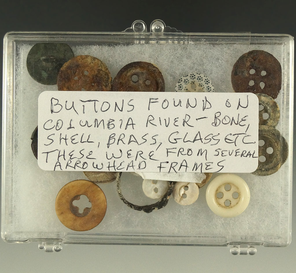 Group of assorted buttons found on several sites near the Columbia - bone, shell, brass, glass.