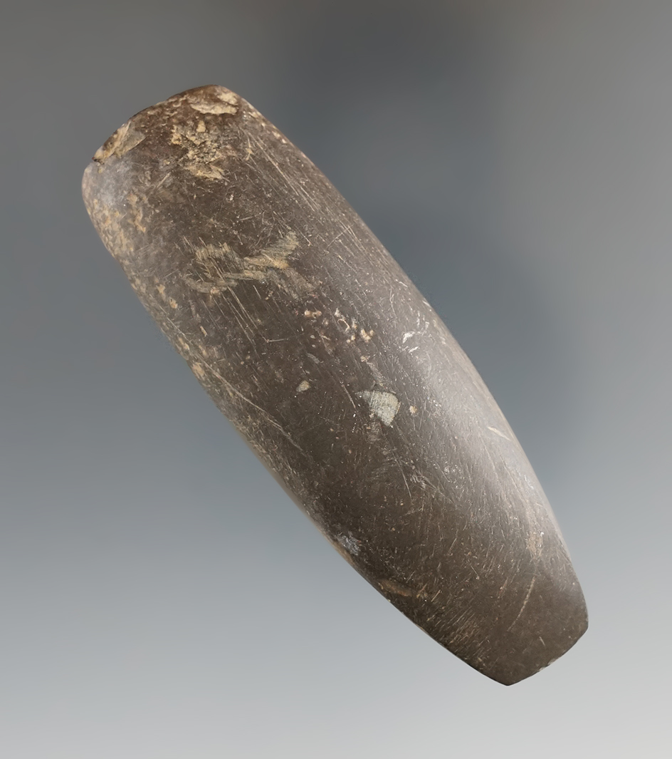 3 1/4" brown slate chisel that is well styled with a nice bit. Found in Ohio.