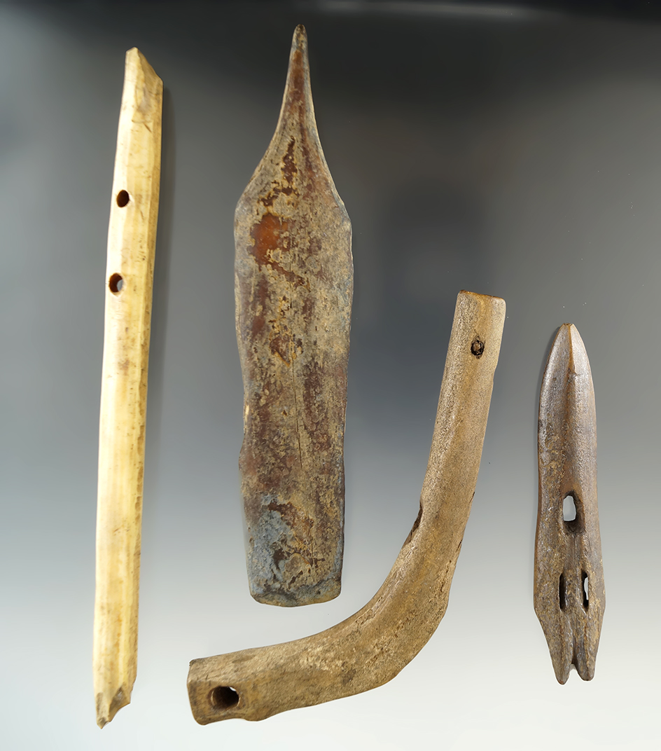 Set of four old Inuit bone artifacts found in Alaska, largest is 6 3/4".