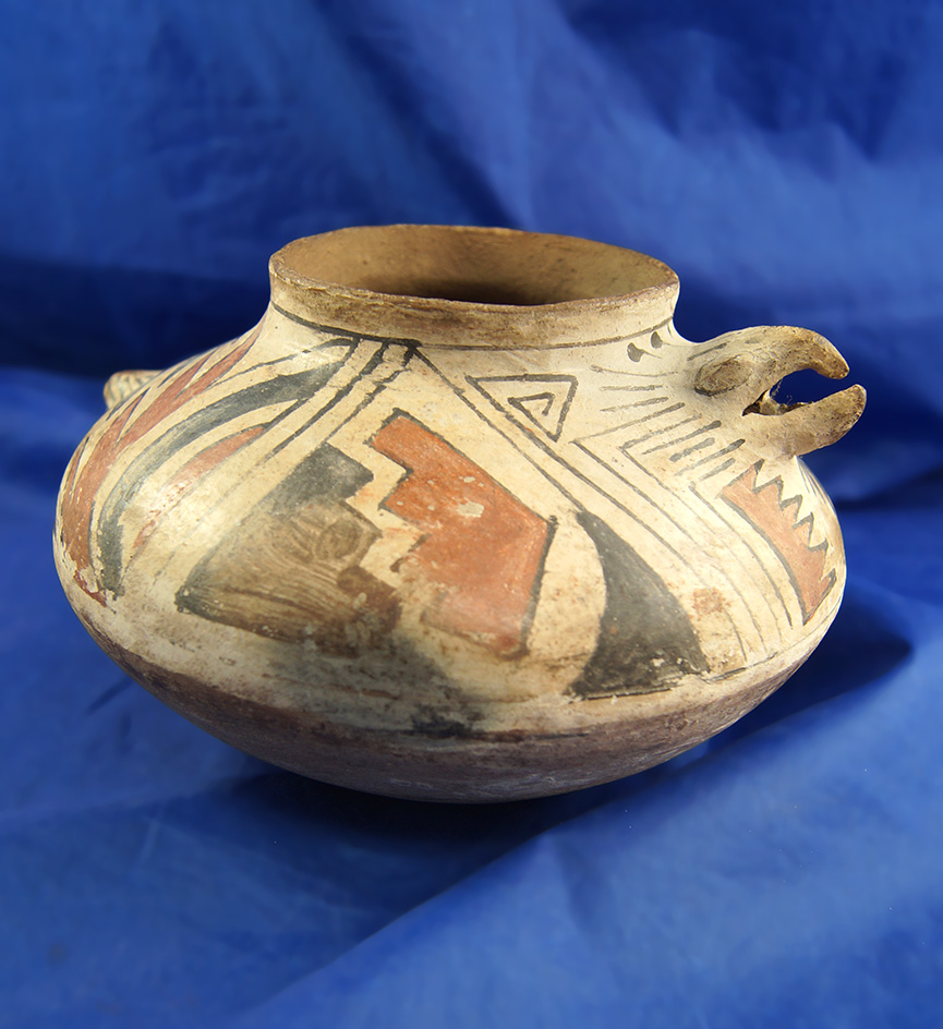 7" wide Casas Grande avian effigy polychrome pottery vessel with nice paint in good condition.