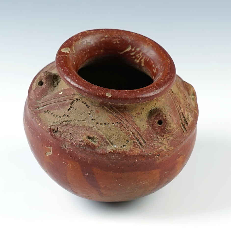 3 3/4" wide x 3 1/4" tall red and orange face effigy Pre-Columbian pottery jar - Costa Rica.