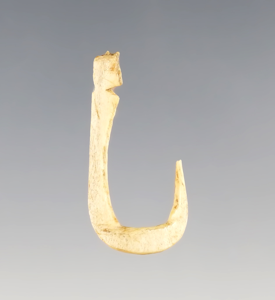 1 1/16" nicely styled Bone Fishhook in excellent condition. Found in the Four Corners area.