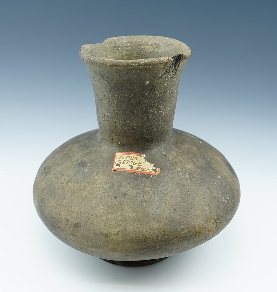 7" tall by 7 1/2" wide Bell Plain Bottle.