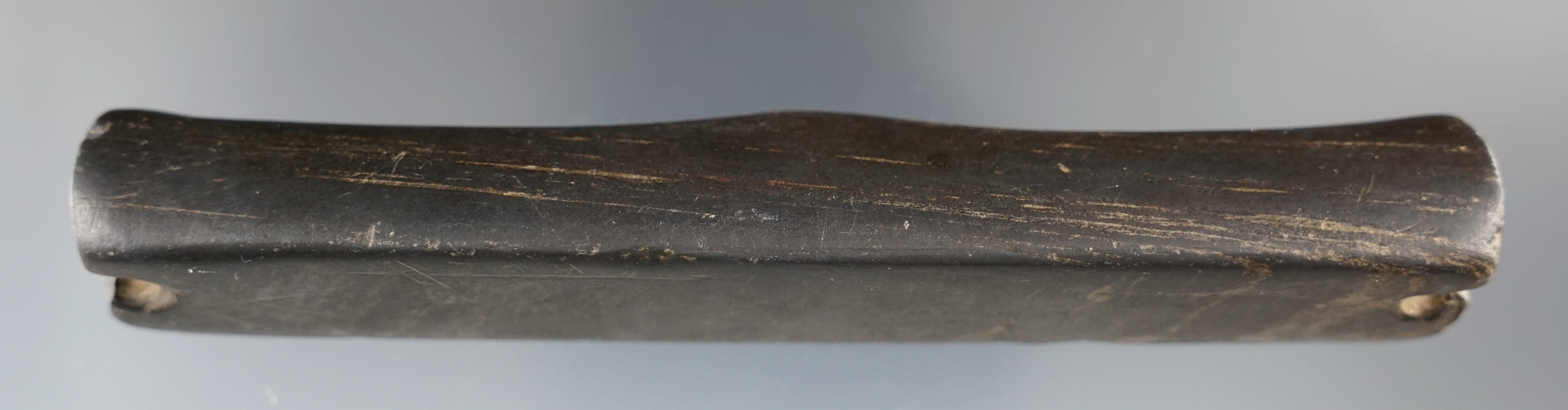 5 1/8" drilled Bar Amulet made from heavily patinated black slate found in Ohio.