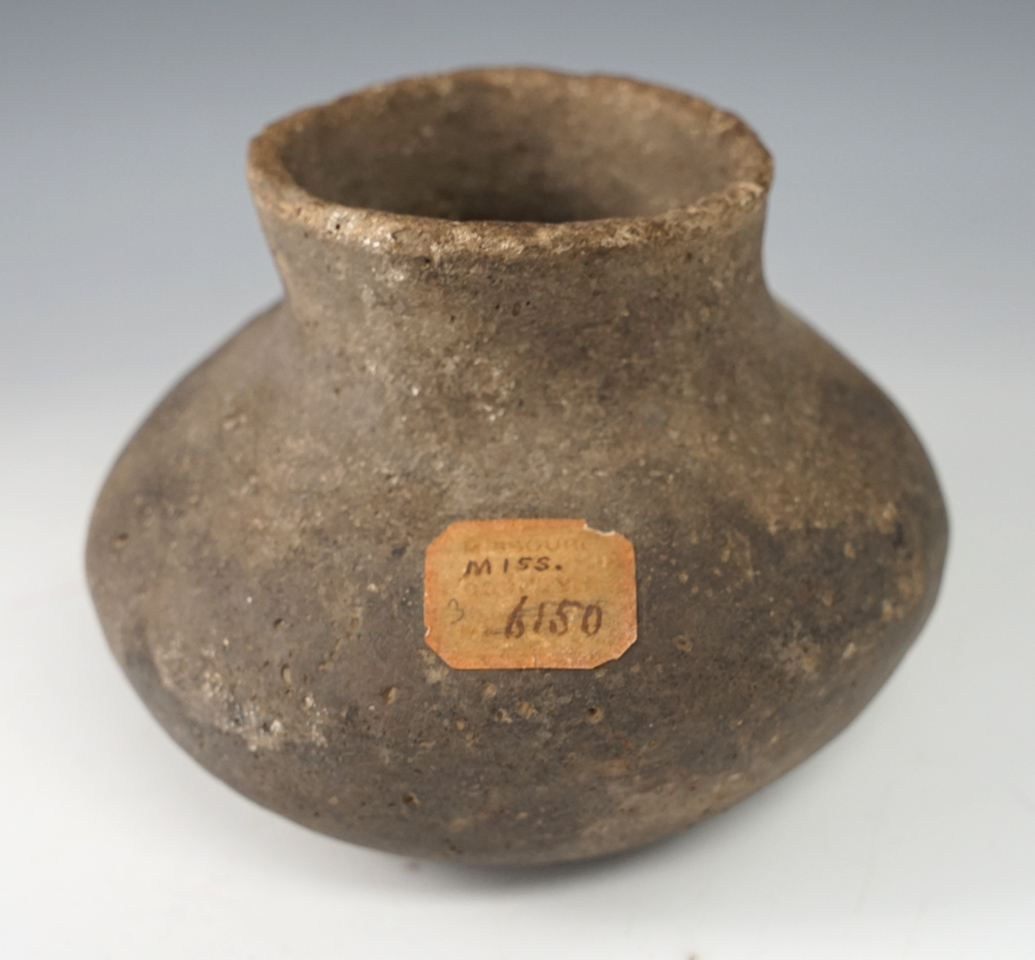 4" tall x 4 1/2" wide shell tempered clay pottery vessel found in Mississippi.