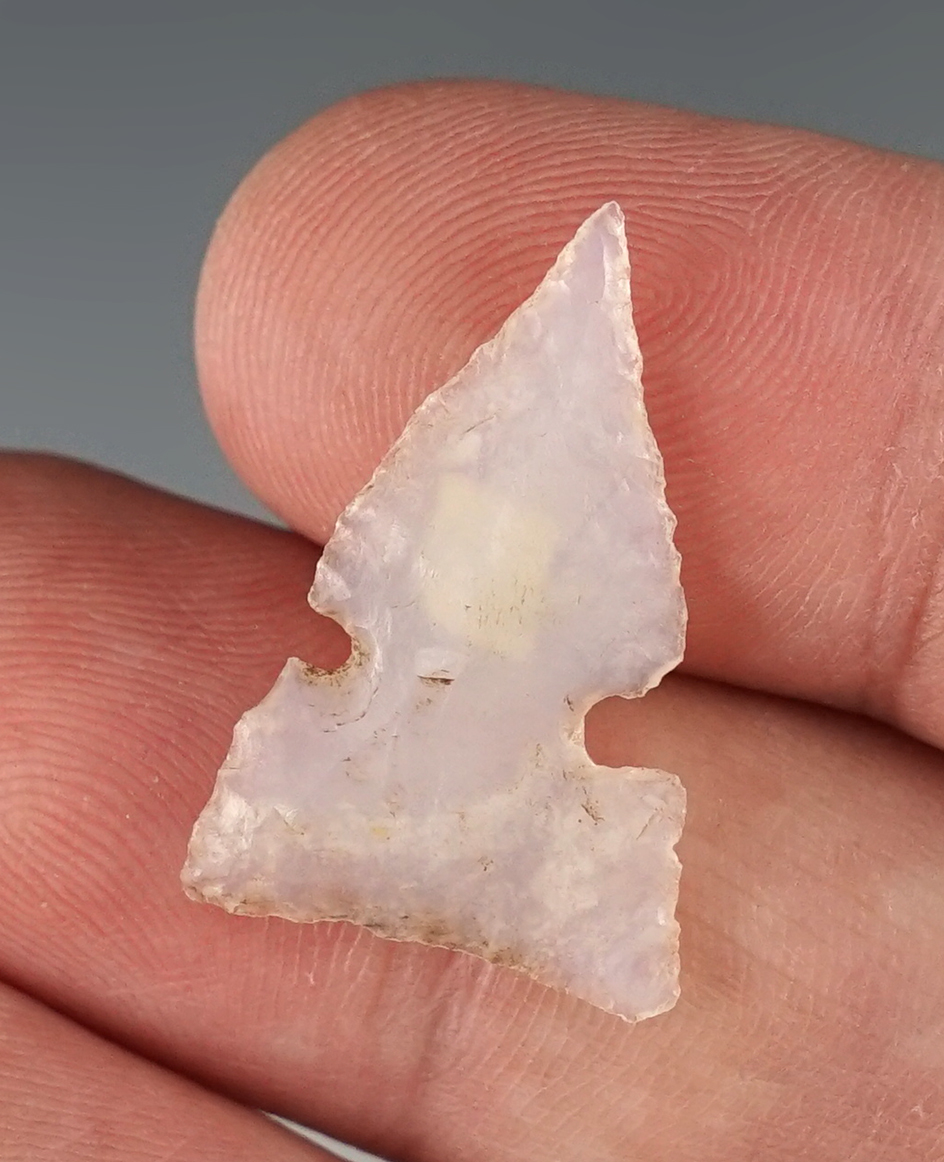 Thin and well made 1 1/16" Notched Triangle Arrow Point found in New Mexico.