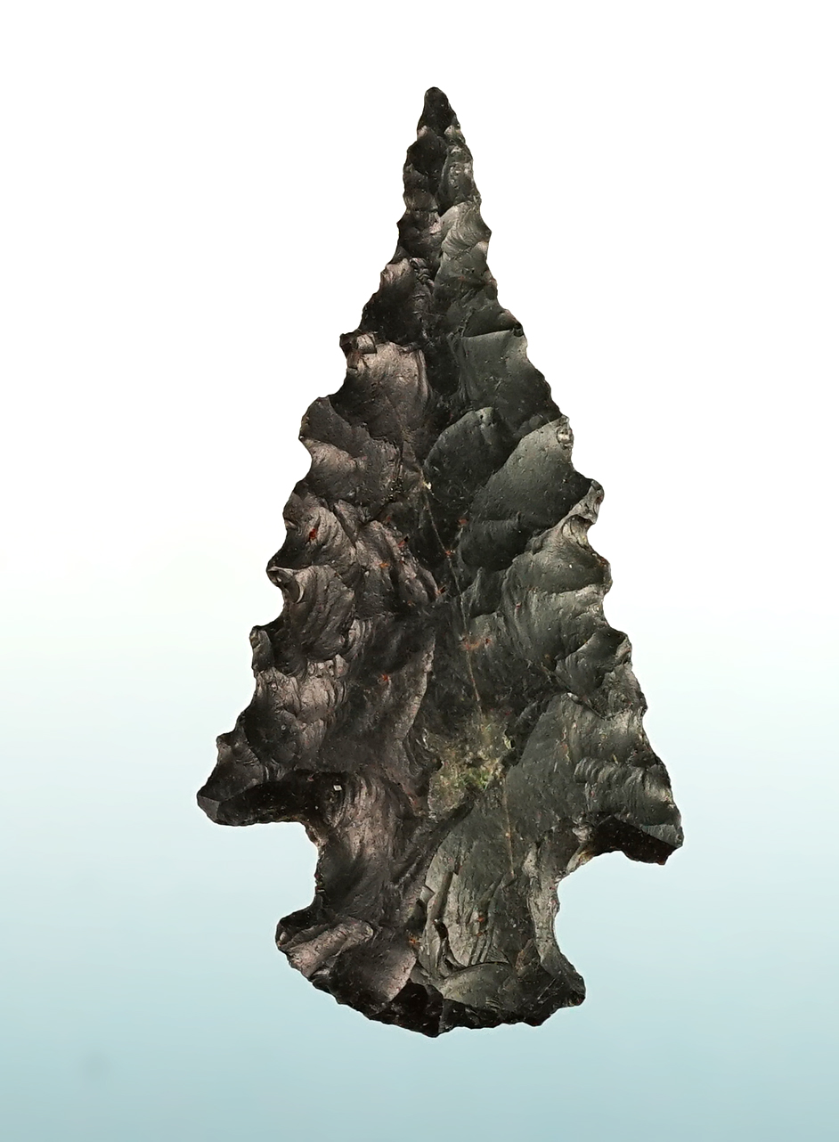 1 5/8" well styled Cornernotch point recovered in Colorado. In nice condition. 