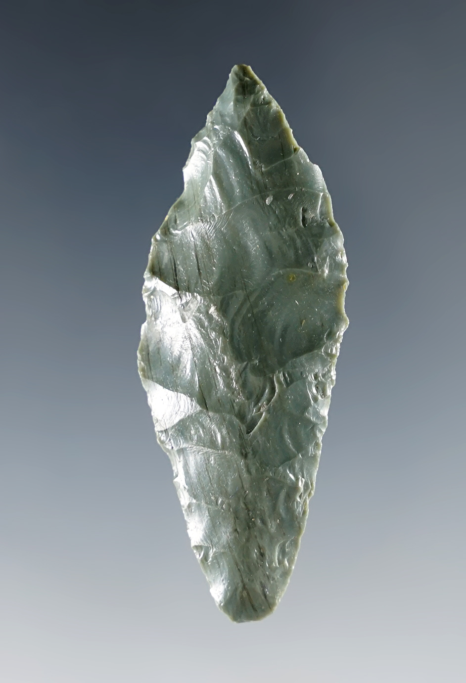 2 1/8" beautifully crafted Paleo Dart, possibly a large Paleo Spedis variant.  Rare green obsidian.