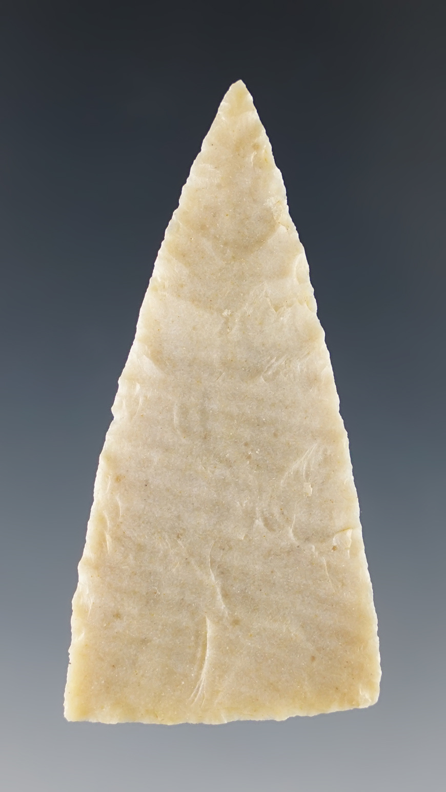 2 1/4" triangular knife that is very nicely flaked recovered in Texas.
