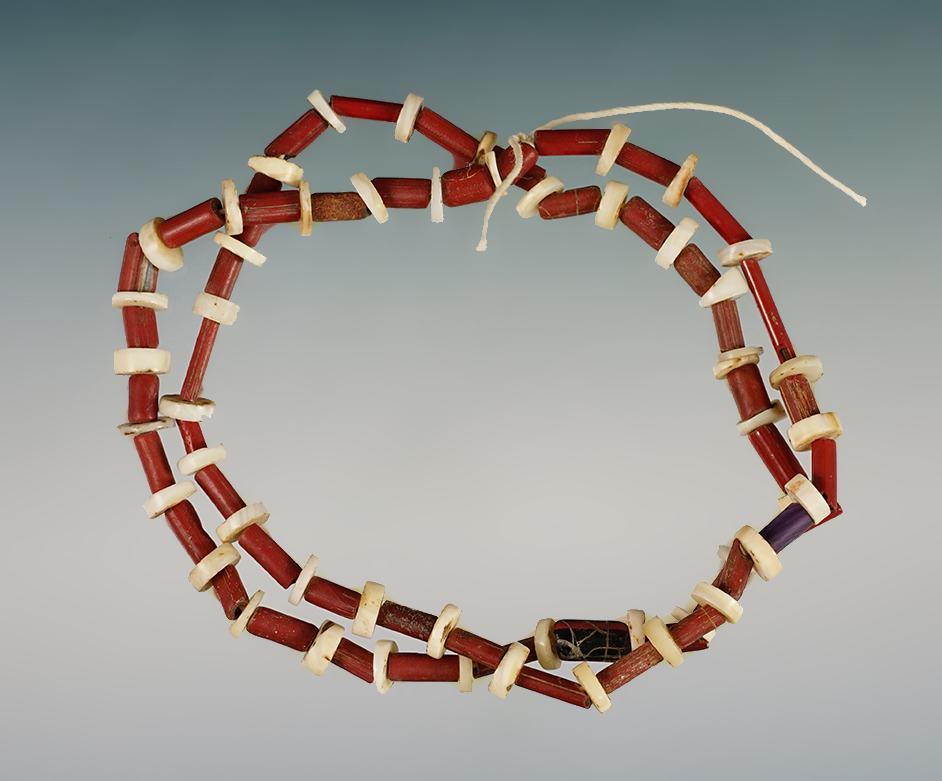 15" Strand of Red Straw and Shell Disc Beads. Found at the Powerhouse Site in Lima, New York