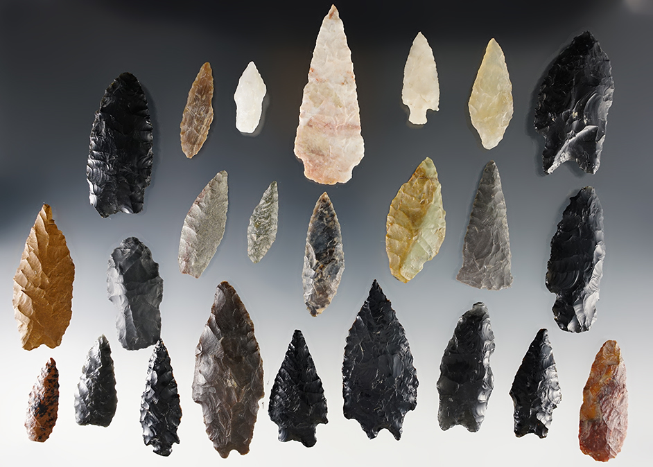 Set of 24 assorted points including 4 Paleo pieces. Found in Nevada. The largest is 2 7/8".