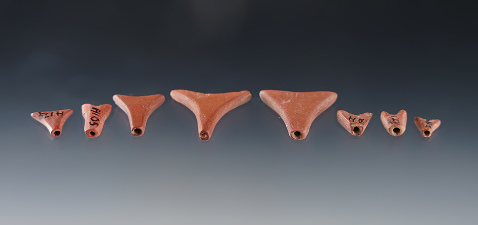 Set of 8 Triangular Catlinite Beads found at the Townley-Read Site, Geneva, New York. 