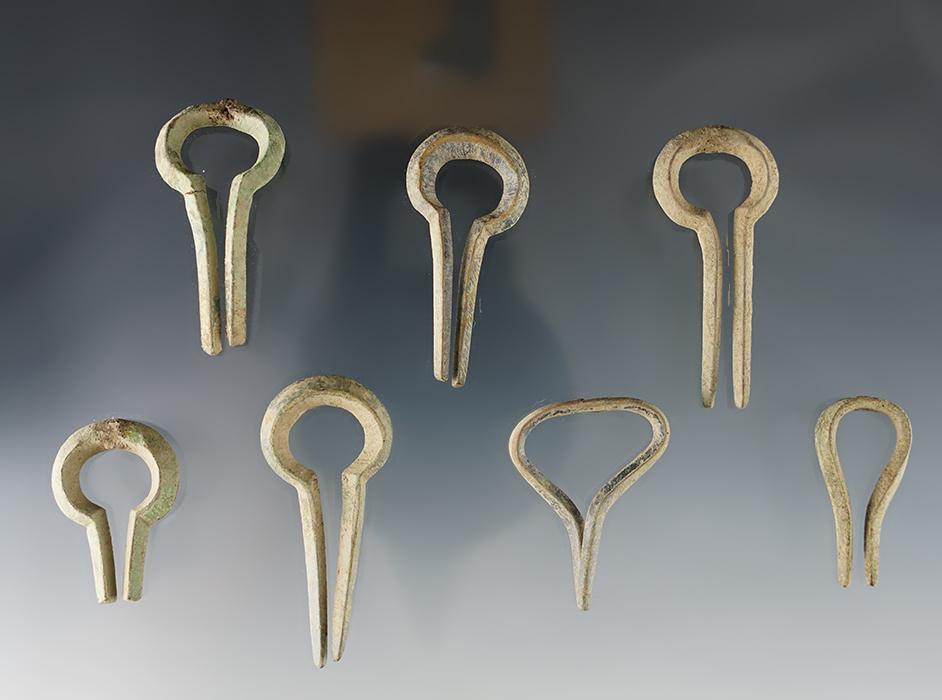 Set of 7 contact period trade Jews Harps - White Springs site in Geneva, New York. Largest is 2".