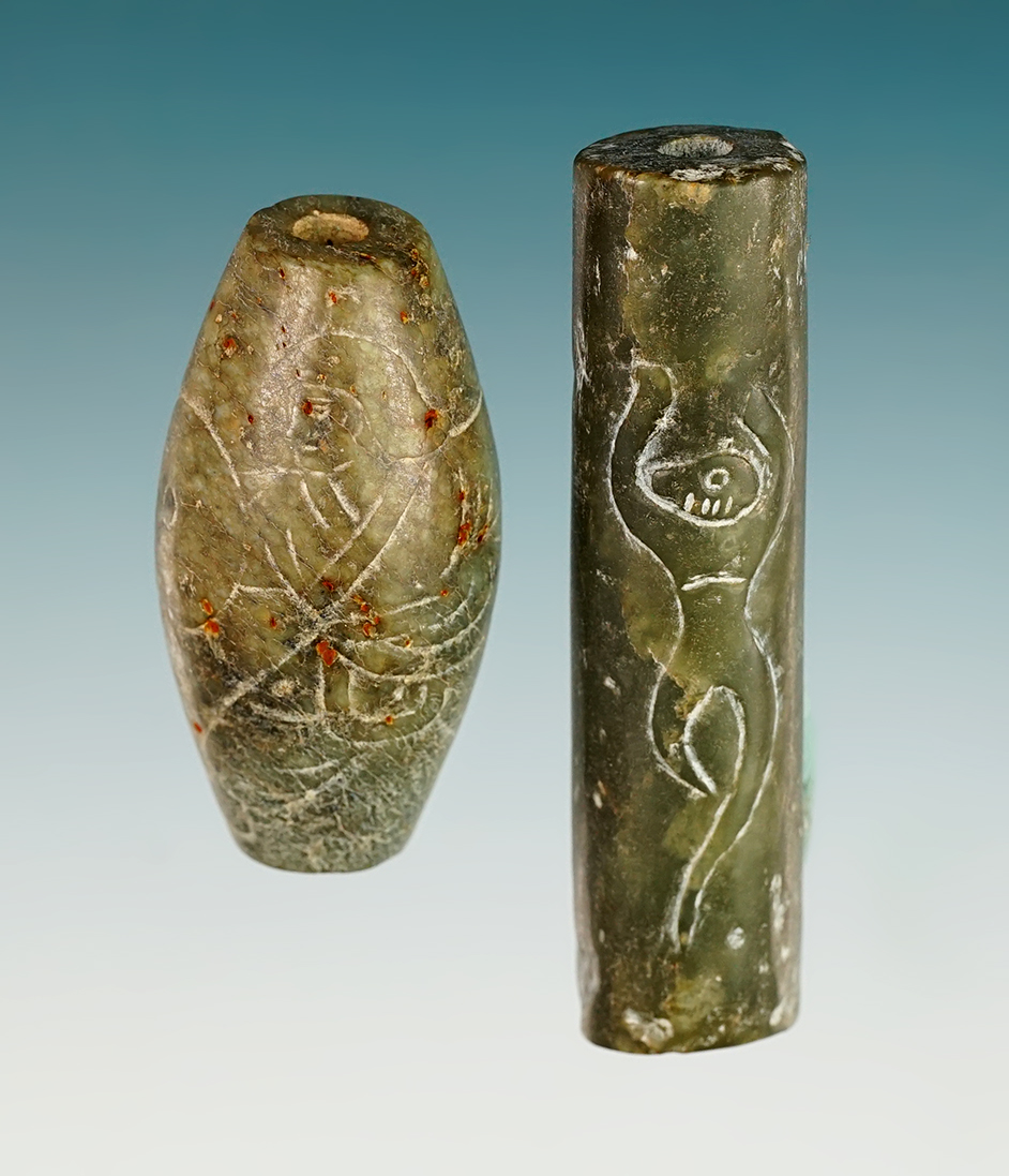 Pair of nicely carved and well styled Beads found in SE Asia. Ex. Clem Collins collection. 