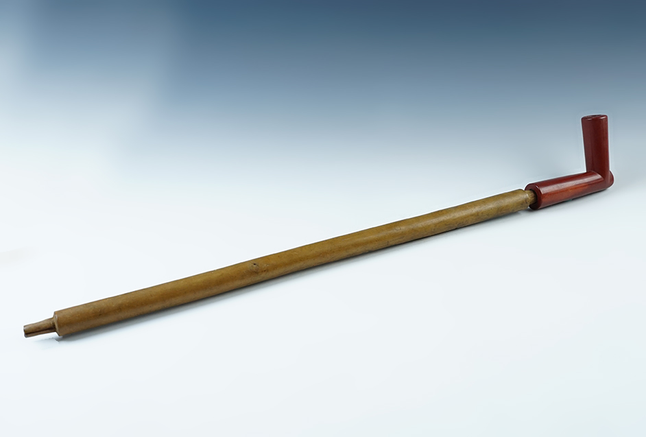 Beautiful late 1800's Catlinite pipe and stem. Pipe measures 4 1/8" long by 2 7/8" tall. 