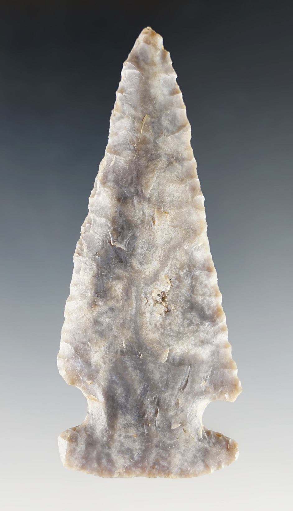 3 1/4" archaic Sidenotch that is nicely styled with good flaking found in Missouri.