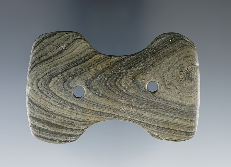 Miniature 2 5/8" Hopewell Reel Gorget with engraving on surface. Found in Miami Co., Ohio.