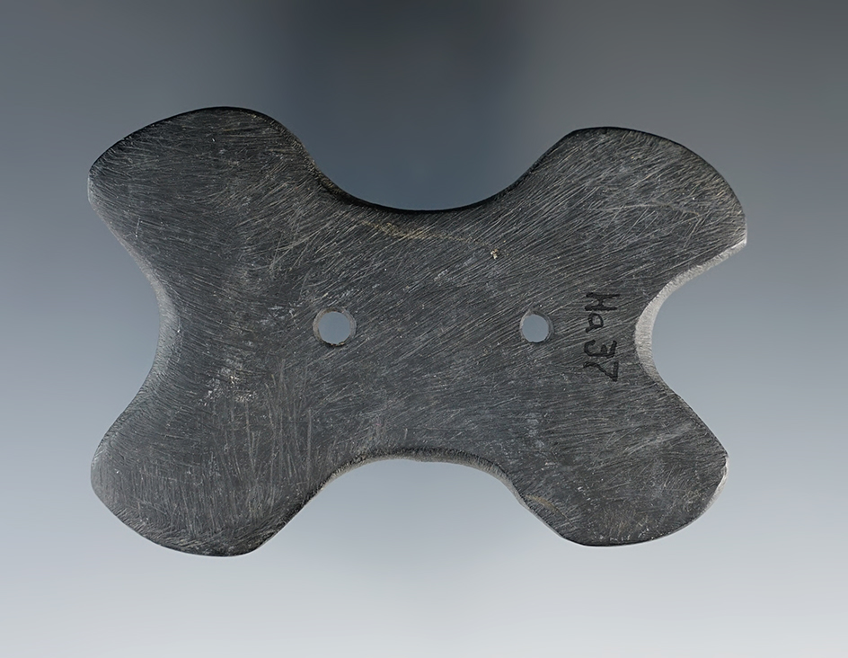 3 1/8" Hopewell Reel Gorget made from black Slate. Found in Boone Co., Indiana. Ex. Dr. Roland Bunch