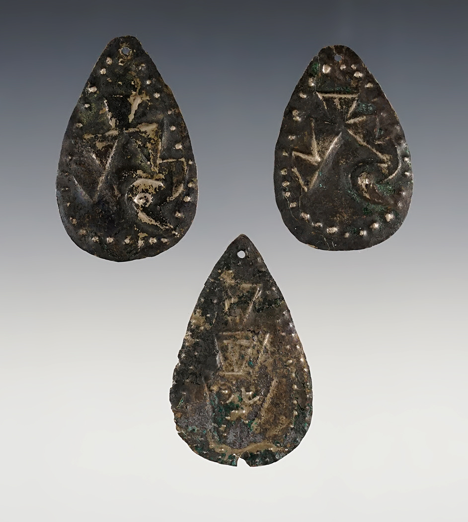 3 Silver sheet metal ornaments with repousse birds and fish designs, S. America