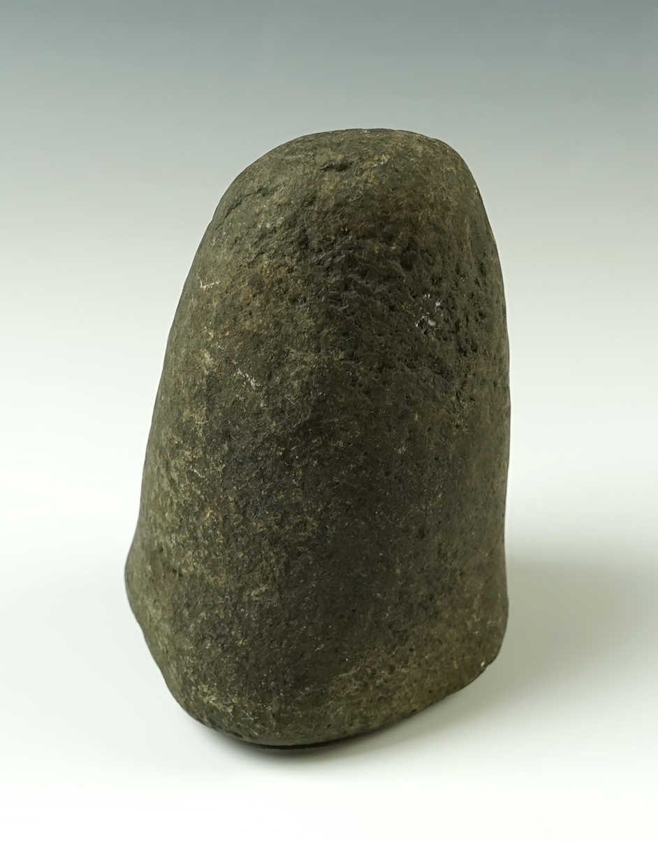 4 3/8" Pestle found in Henry Co., Ohio. Nicely made with a well polished divot on the base.