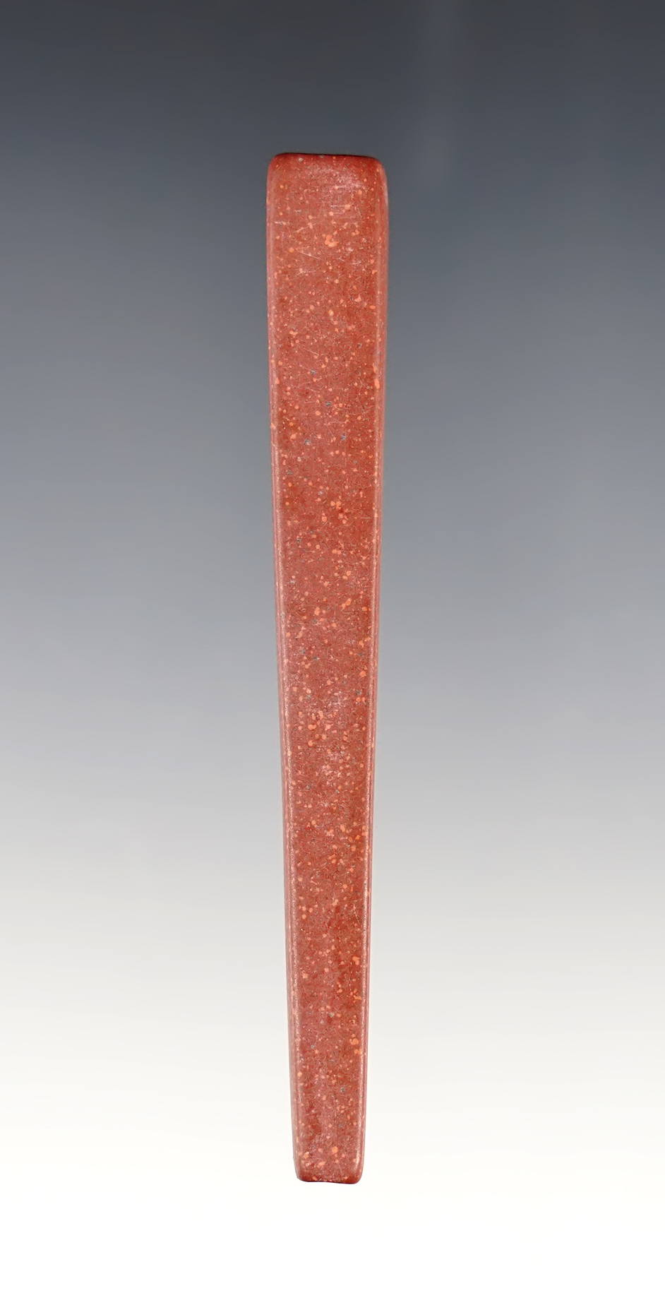 Well styled 3 1/8" Trapezoidal Bead made from Catlinite. Recovered at the Townley Reed Site in Geneva, New York. 