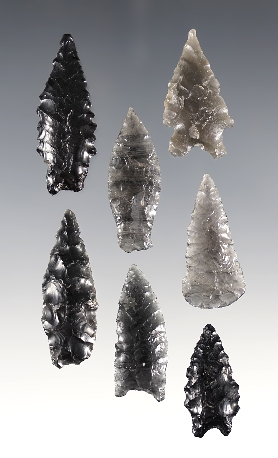 Nice set of 7 assorted arrowheads made from Obsidian. Found in Oregon. Largest is 1 3/8".