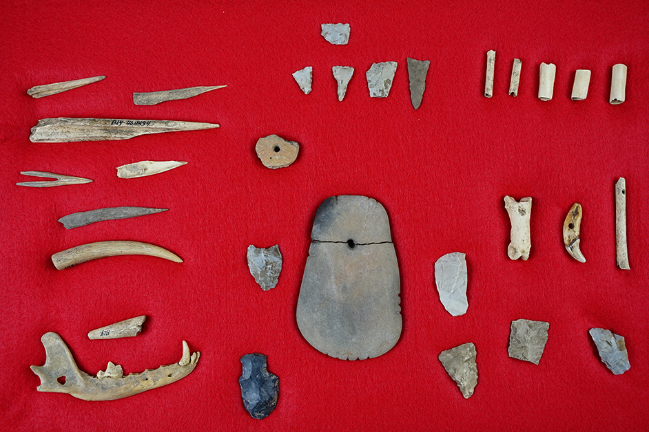 Group of assorted artifacts recovered in Ohio including projectile points, stone beads, Etc‚Ä¶..