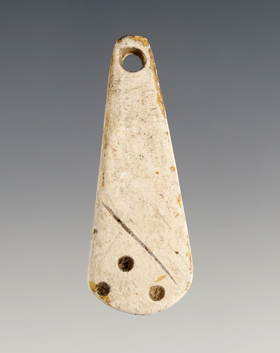 1 13/16" Drilled Shell Pendant with punctate design.  Fox Field  Site in Mason Co., Kentucky. 