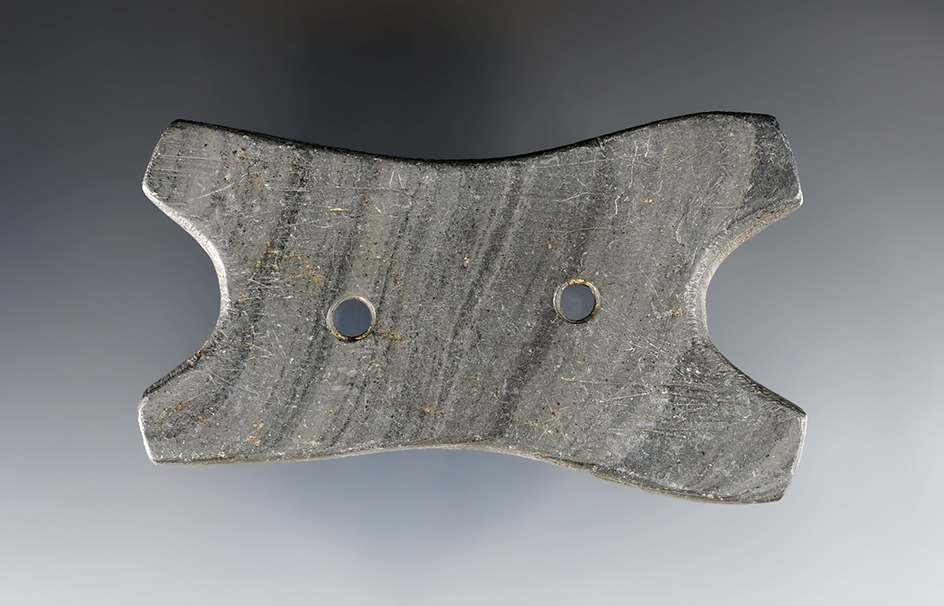 3 7/16" Hopewell Reel Gorget made from gray and black Banded Slate. Marion Co., Ohio