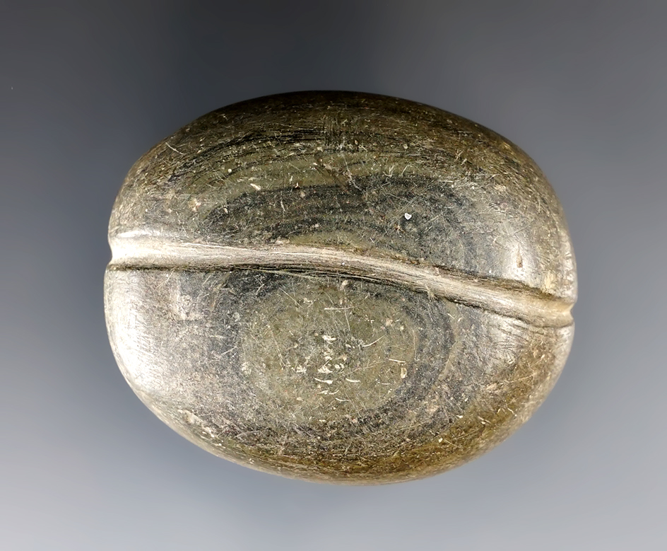 2 1/4" Adena Grooved Loafstone made from green and black Banded Slate. Found in Marion Co., Ohio.