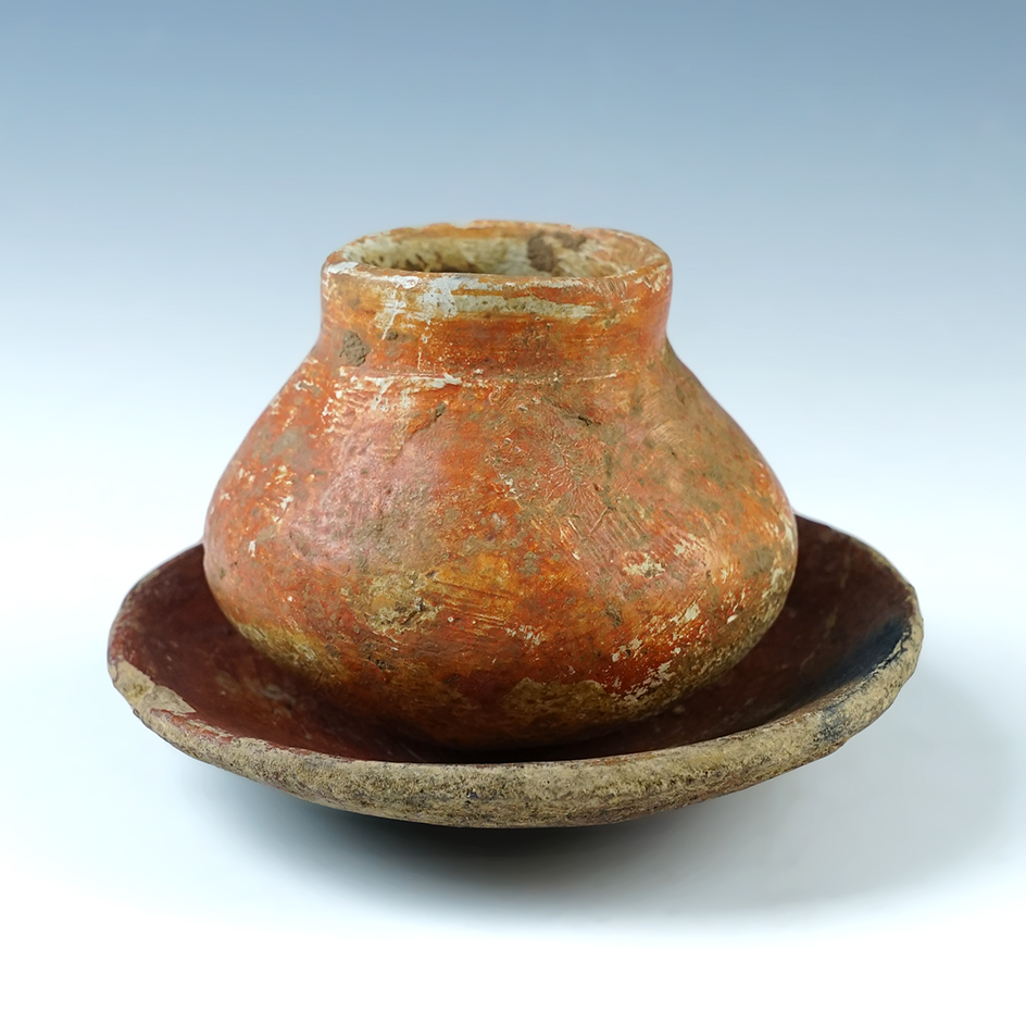 Pair of Pre-Columbian pottery items including a 4 5/8" diameter plate and a 2 1/2" tall jar. Mexico.