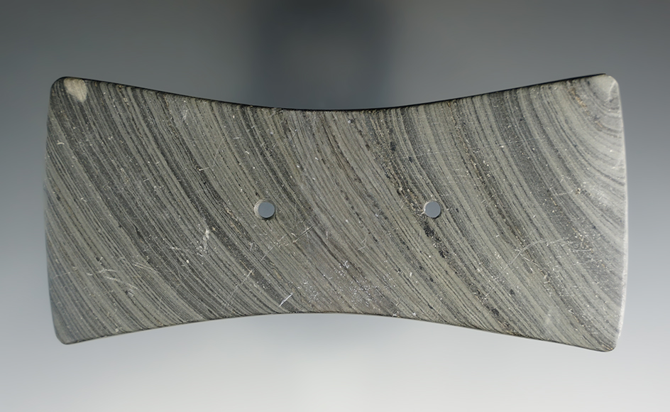 4 3/4" Bi-Concave Gorget made from gray and black Banded Slate. Found in Ontario, Canada.