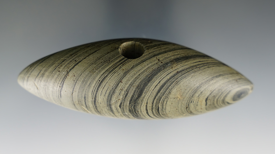 4" Archaic Pick Bannerstone made from green and black Banded Slate. Found in Logan Co., Ohio.