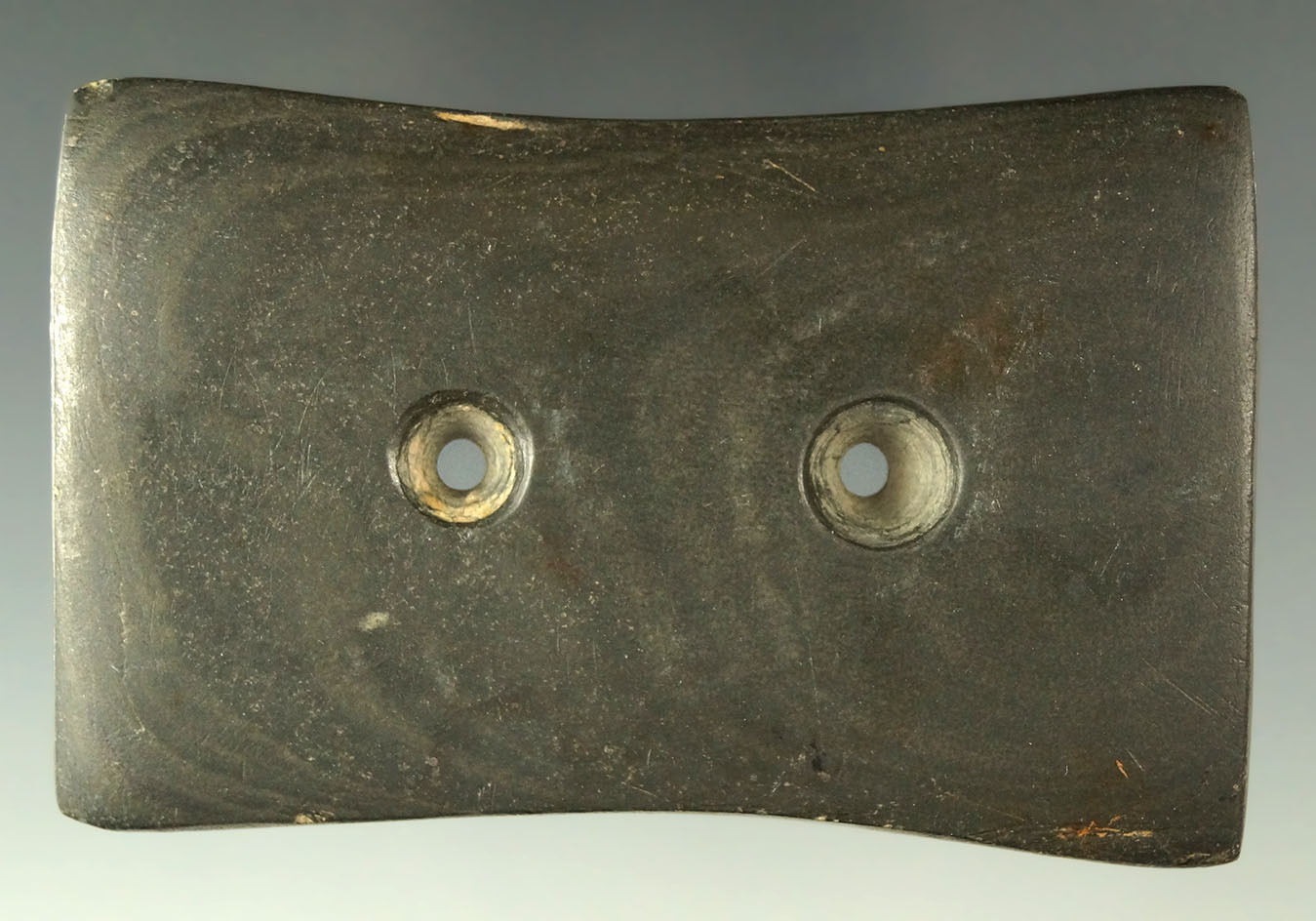 Heavily patinated 3 1/4" Bi-Concave Gorget found in Putnam Co., Ohio. Ex. Parks, Anderson, Kiel.
