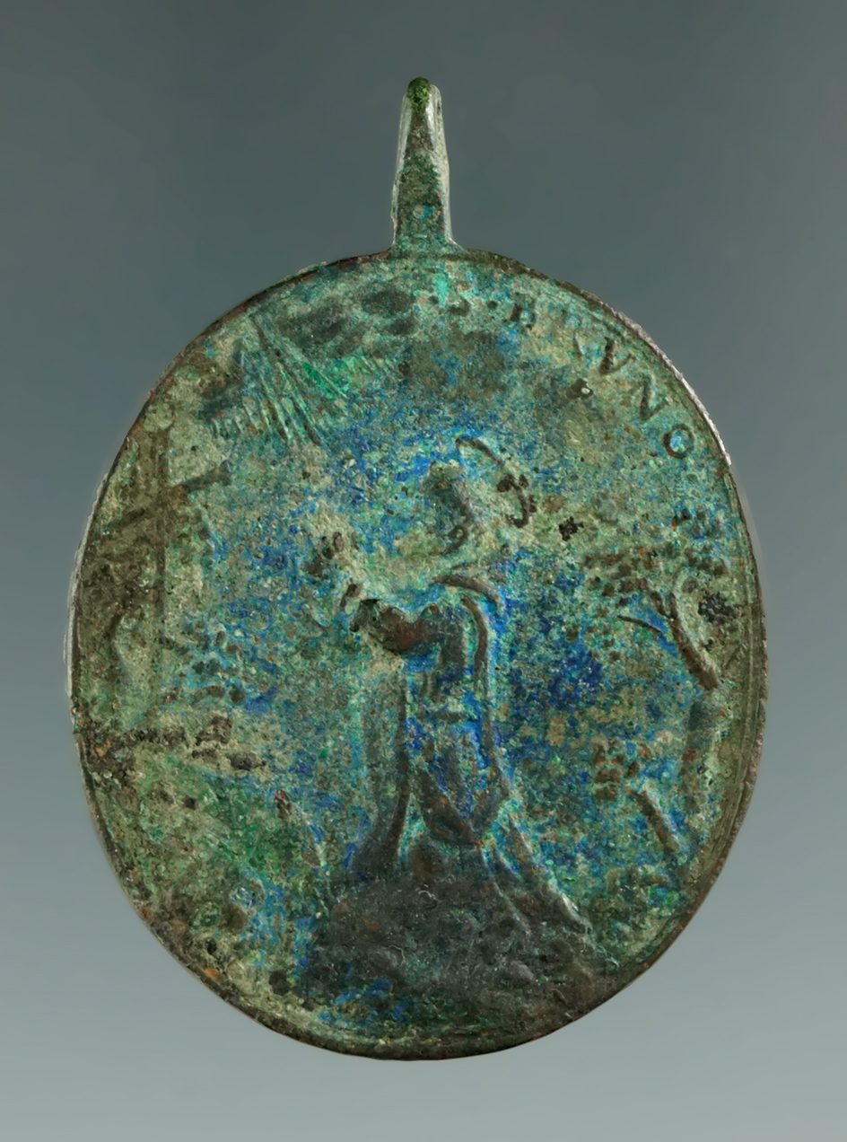 Pictured! 1 7/8" brass religious trade pendant  circa 1750-1840 found in New York.