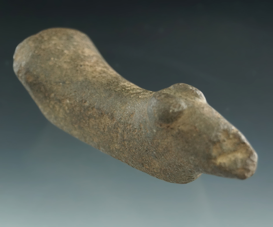 3 7/8" undrilled Birdstone with unique Popeyes. Some ancient damage. Found in New York.