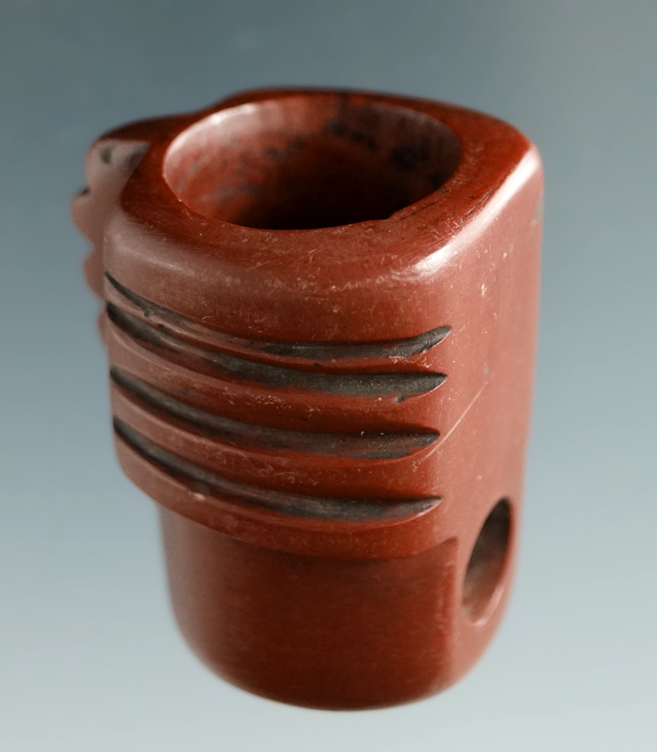 Excellent craftsmanship and detail on this highly stylized 1 1/2" tall Catlinite pipe - New York.