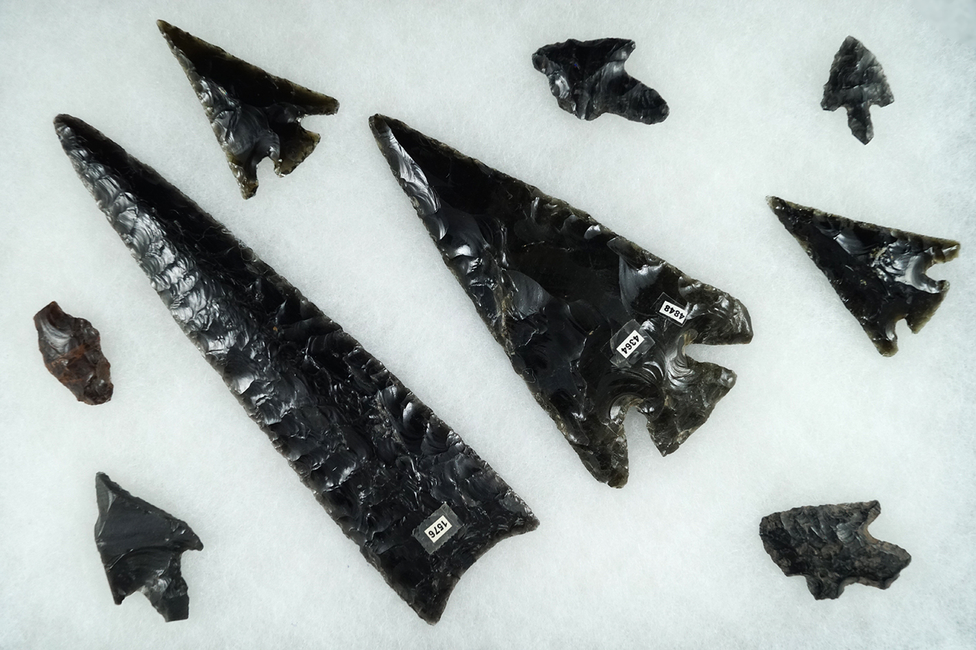 Group of 9 Mexican Obsidian artifacts.  Largest is 7".