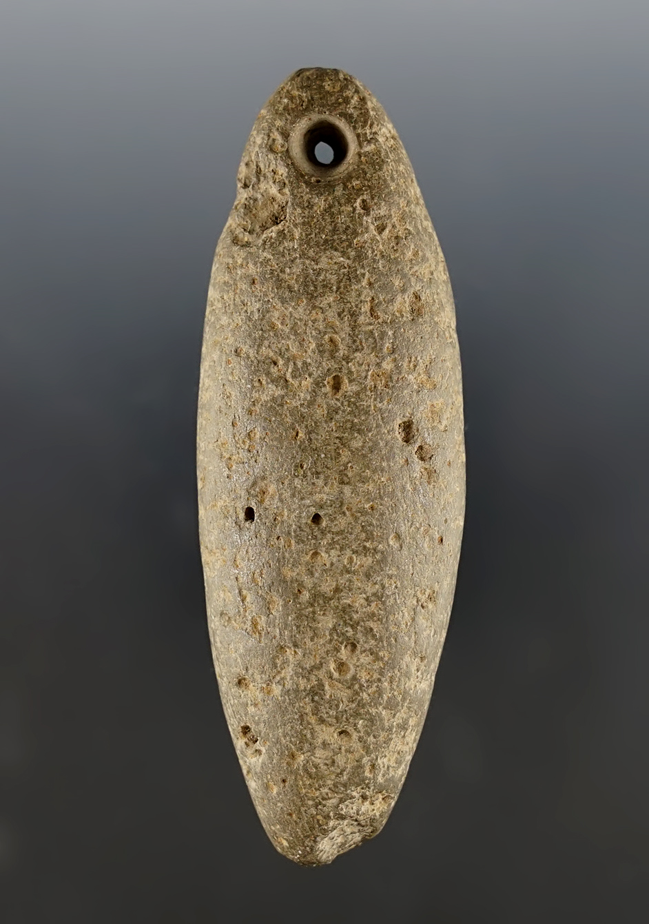 3 7/8" California Perforated Charm Stone with excellent age on surface. 